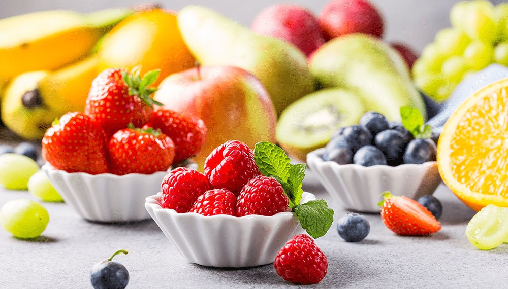 fruits in white cups