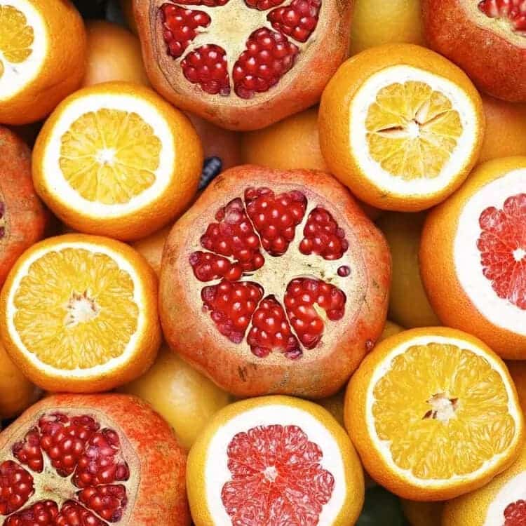 colorful citrus fruits sliced open